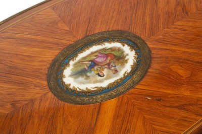 Lot 46 - A French gilt brass mounted kingwood and tulipwood centre table