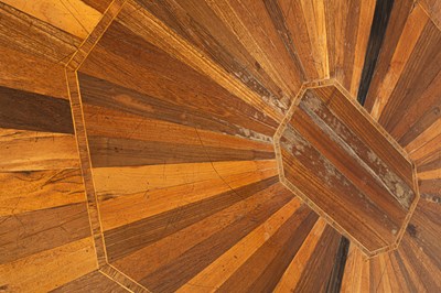 Lot 111 - A late George III rosewood banded exotic specimen wood octagonal breakfast table