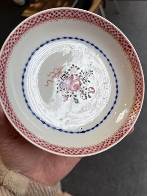 Lot 81 - A set of three Chinese famille rose tea bowls and saucers