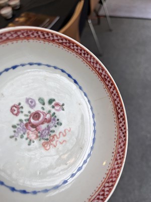 Lot 81 - A set of three Chinese famille rose tea bowls and saucers