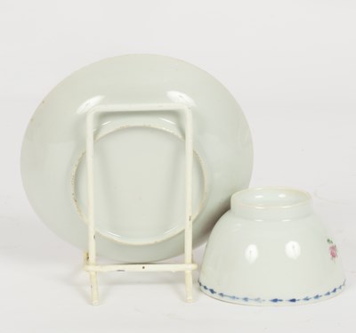 Lot 81 - A set of three Chinese famille rose tea bowls and saucers
