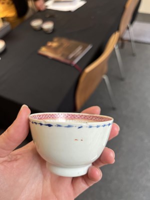 Lot 81 - A set of three Chinese famille rose tea bowls and saucers