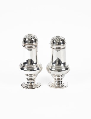 Lot 8 - A pair of silver sugar casters
