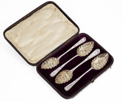 Lot 7 - Four George III silver berry spoons