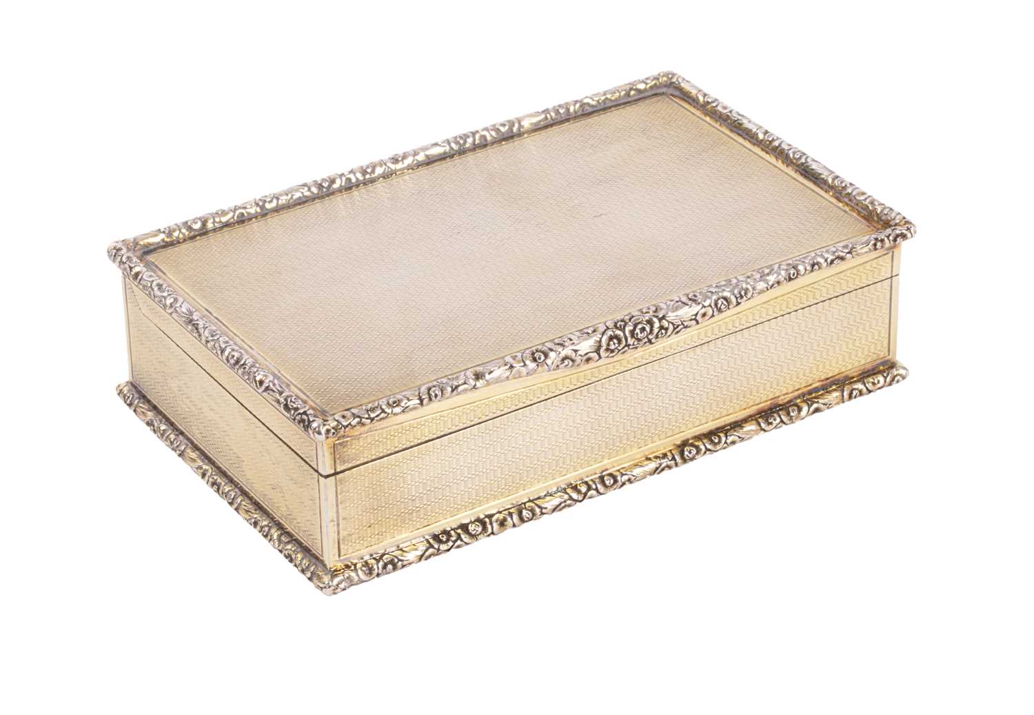 Lot 71 - An Edwardian silver gilt cigarette box