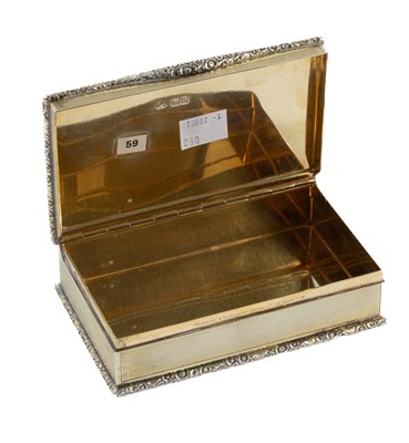 Lot 71 - An Edwardian silver gilt cigarette box
