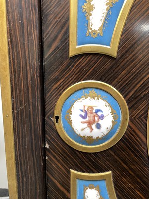 Lot 51 - A pair of Napoleon III calamander pier cabinets