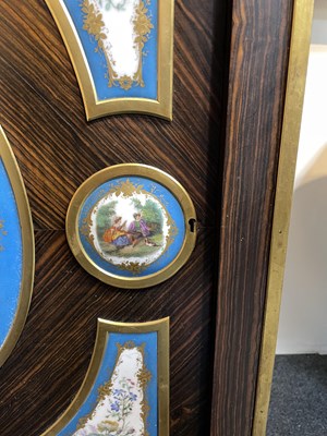 Lot 51 - A pair of Napoleon III calamander pier cabinets