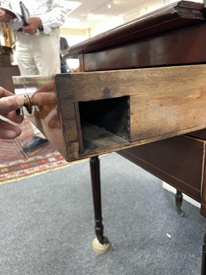 Lot 19 - A Regency rosewood banded ebony and boxwood strung games Pembroke table