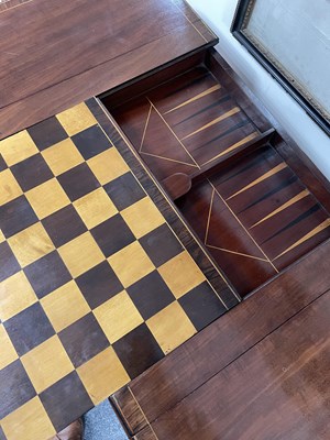 Lot 19 - A Regency rosewood banded ebony and boxwood strung games Pembroke table