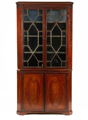 Lot 49 - A George III boxwood strung mahogany corner cupboard