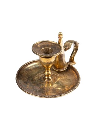 Lot 32 - A George III silver gilt miniature chamber candlestick