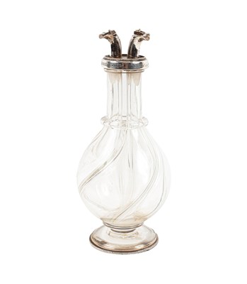Lot 34 - A Victorian silver mounted four-section spirit decanter