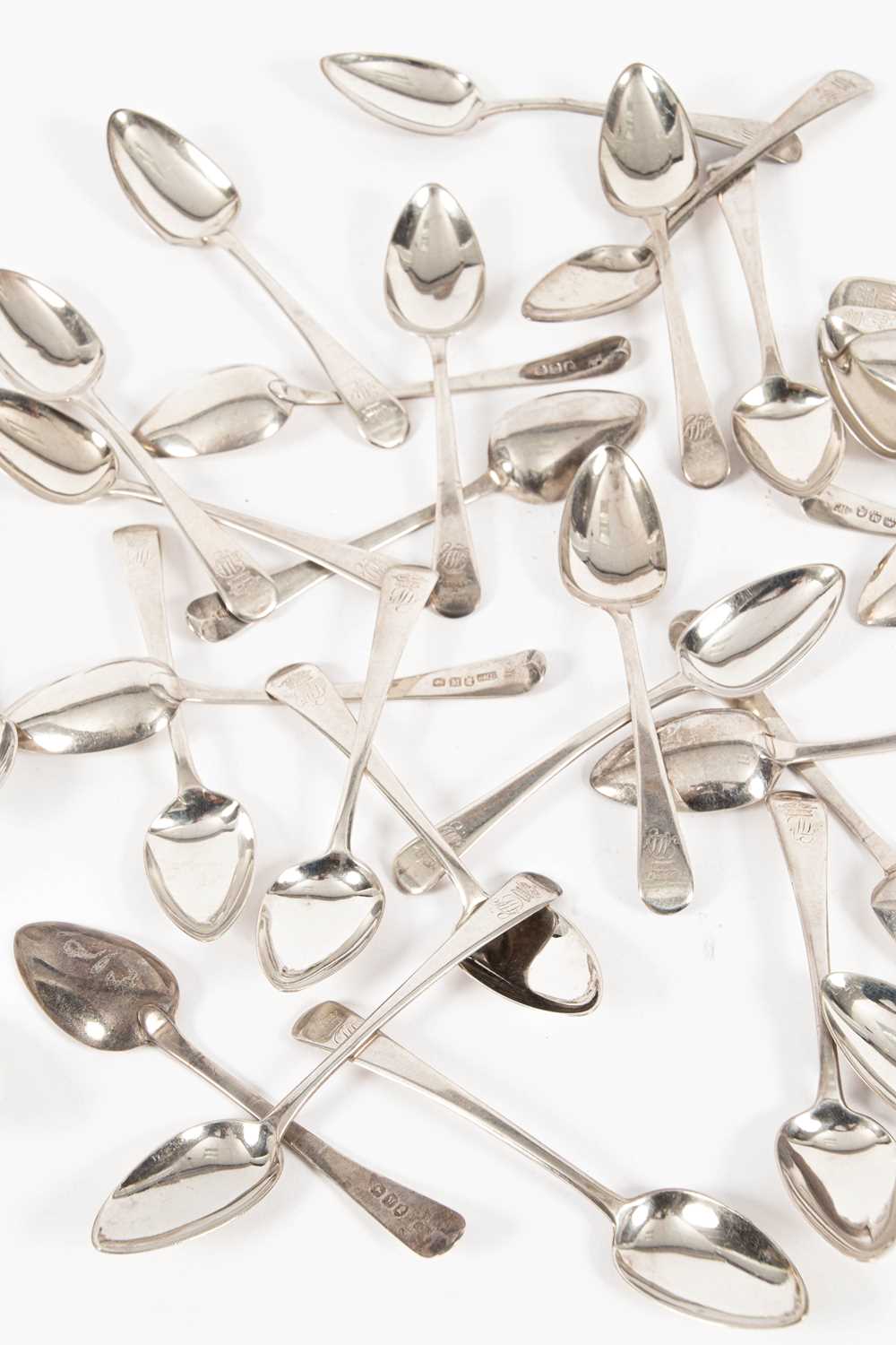 Lot 35 - An unusually long set of forty-six George III silver teaspoons