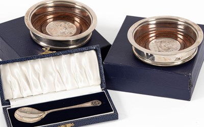 Lot 88 - A pair of commemorative silver wine coasters