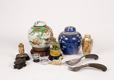 Lot 34 - A jade horse on a wooden stand
