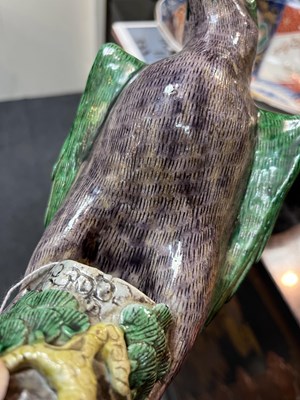 Lot 19 - A pair of Chinese stoneware figures of hawks