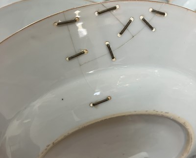 Lot 22 - A set of four Chinese famille rose plates