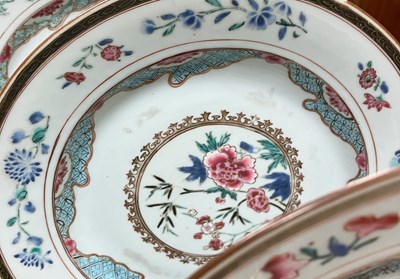 Lot 22 - A set of four Chinese famille rose plates