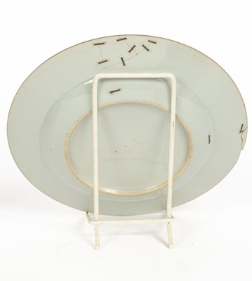 Lot 22 - A set of four Chinese famille rose plates