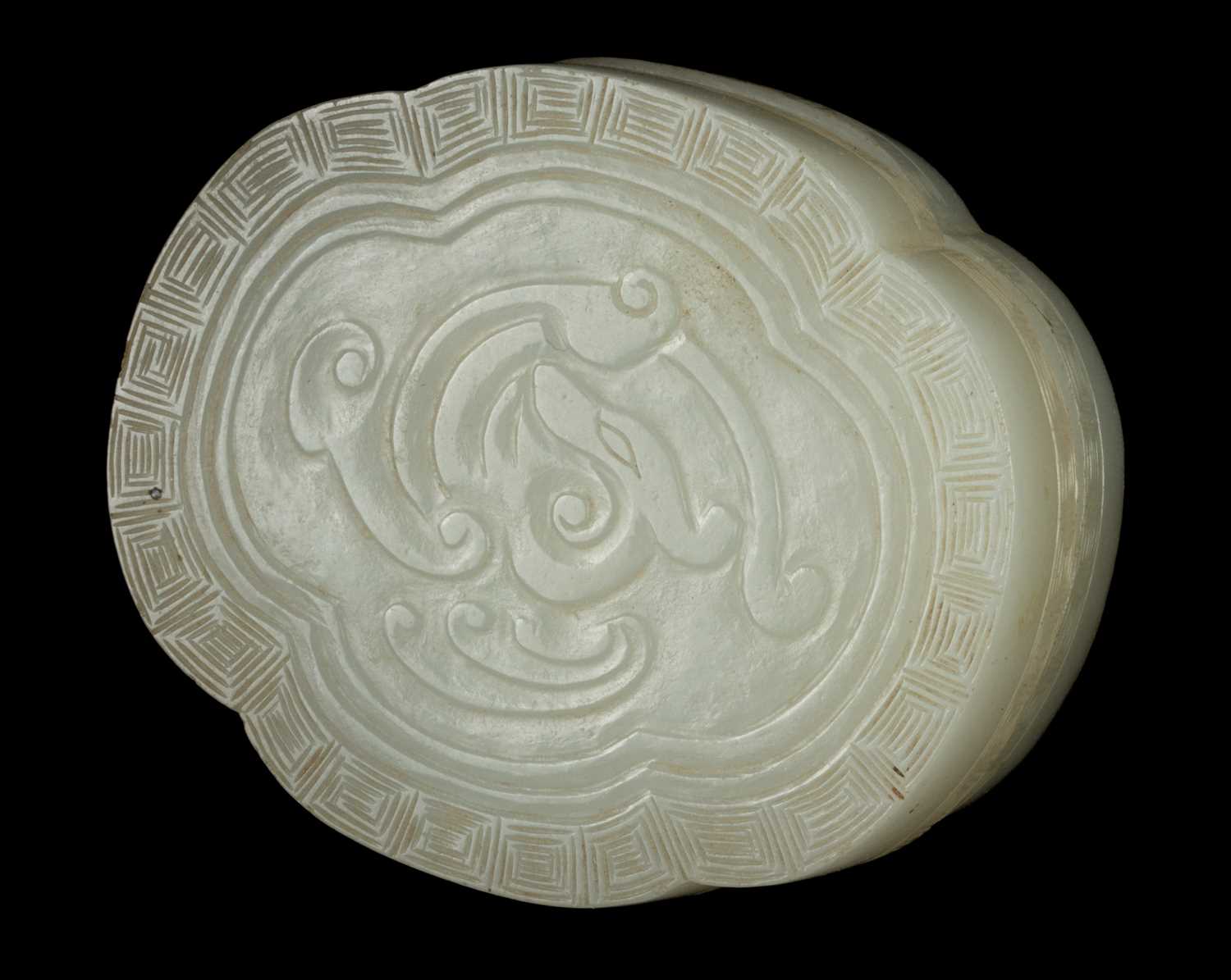 Lot 17 - A Chinese jade box and cover