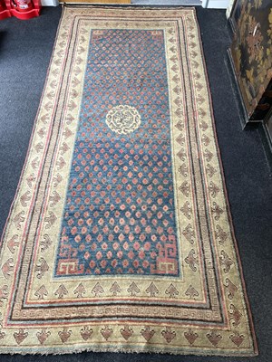 Lot 296 - A Khotan long rug