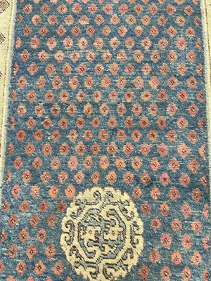Lot 296 - A Khotan long rug