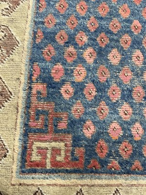 Lot 296 - A Khotan long rug
