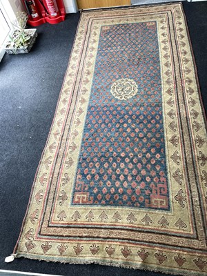 Lot 296 - A Khotan long rug