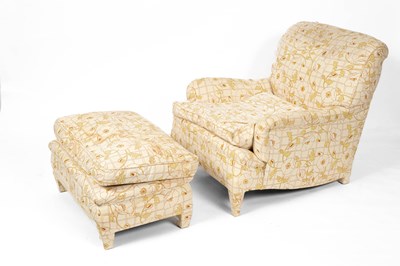 Lot 608 - An armchair and matching footstool