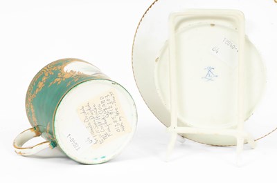 Lot 505 - A Sèvres green ground cup and saucer