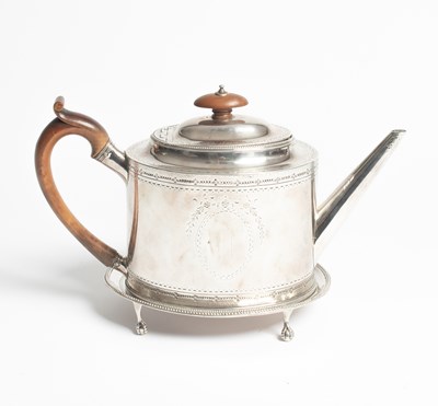 Lot 25 - A George III silver teapot and stand