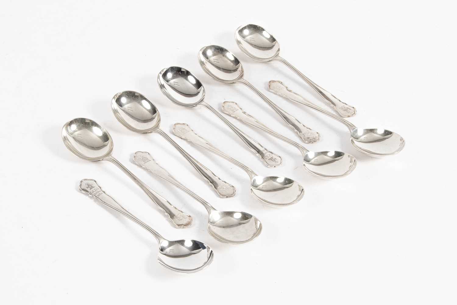 Lot 1 - A closely matched set of ten silver soup spoons