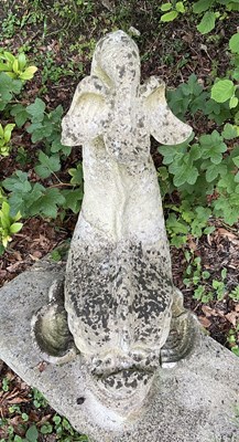Lot 12 - A reconstituted stone figure of a dolphin