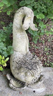 Lot 12 - A reconstituted stone figure of a dolphin