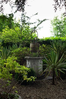 Lot 26 - A hexagonal reconstituted stone wellhead
