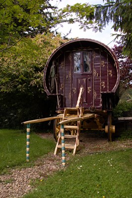 Lot 31 - A burgundy and yellow gypsy caravan