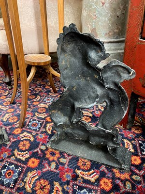 Lot 37 - A pair of cast iron lion door stops
