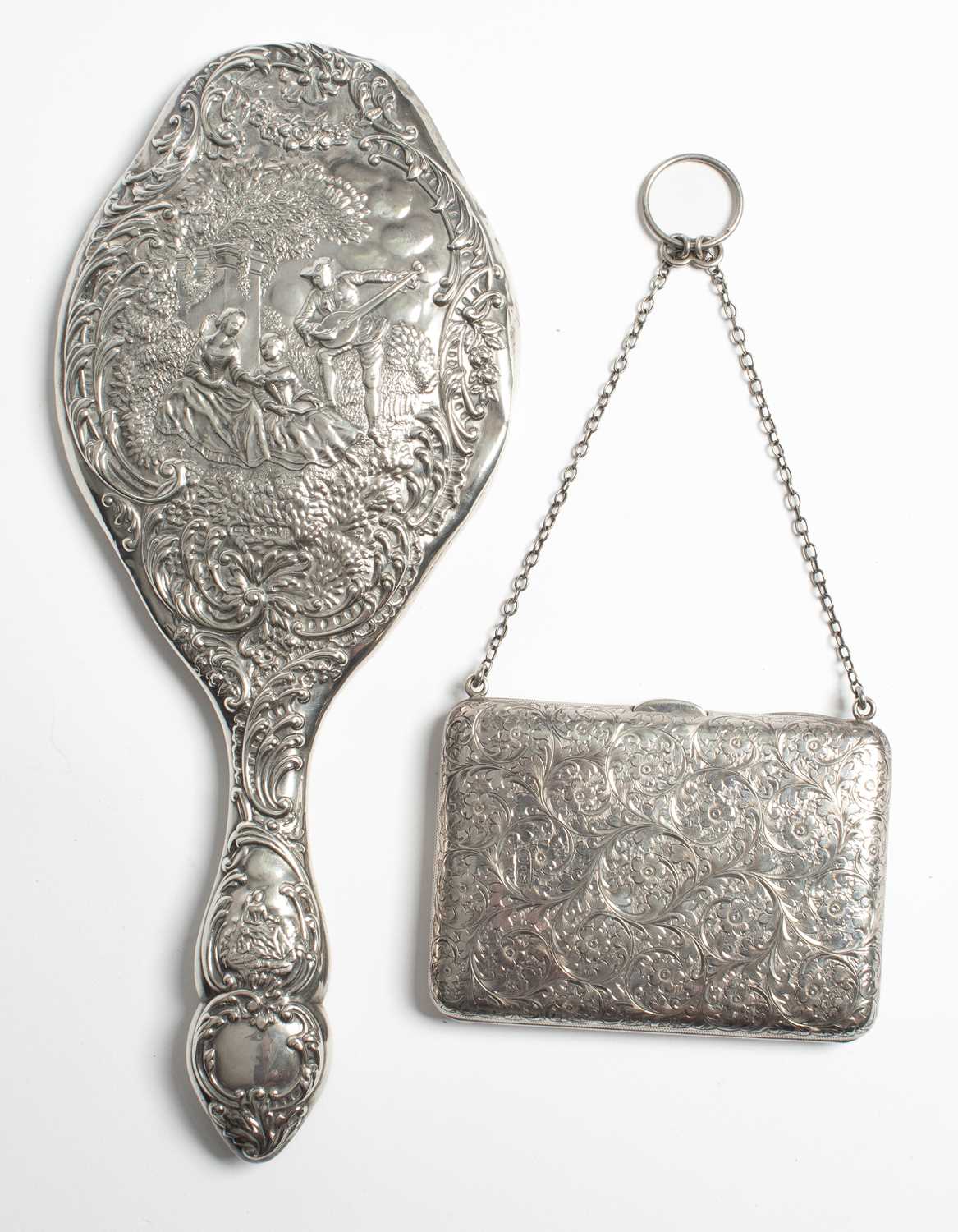 Lot 17 - An Edwardian silver mounted card case and evening purse