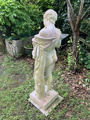 Lot 40 - A reconstituted stone figure of a youth