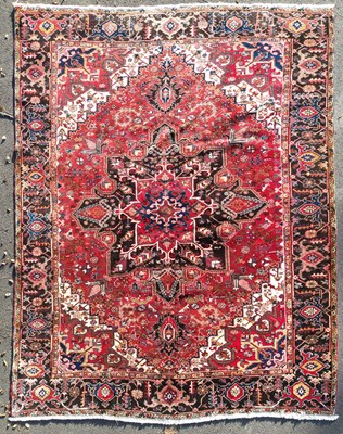 Lot 637 - A Heriz carpet, North West Persia