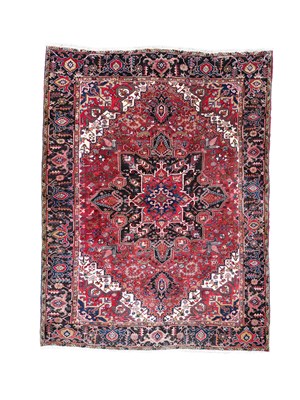 Lot 420 - A Heriz carpet, North West Persia