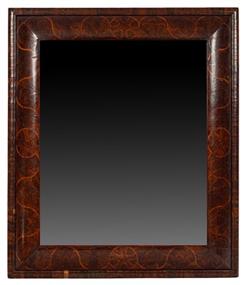 Lot 44 - A large William & Mary style oyster and inlaid cushion frame mirror