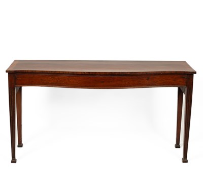 Lot 632 - A George III mahogany serpentine front serving table