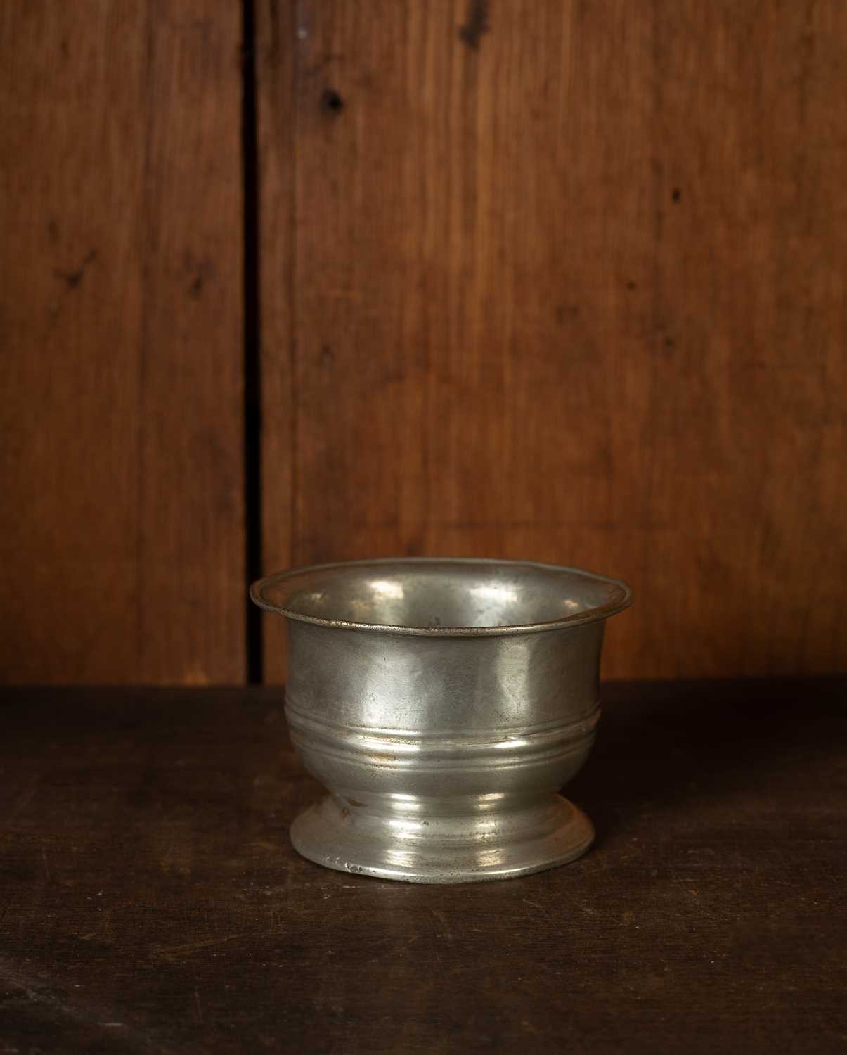 Lot 110 - An English pewter broth bowl