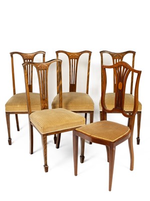 Lot 670 - A set of four Edwardian stained and inlaid chairs