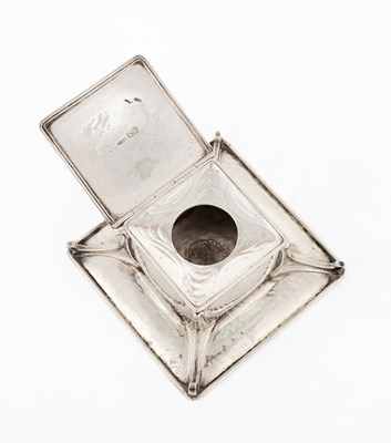 Lot 60 - An Arts & Crafts silver and green enamel inkstand