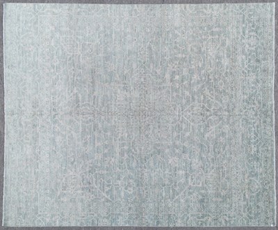 Lot 621 - A large hand tufted carpet of Heriz design