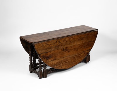 Lot 706 - An early 18th Century oak and elm gateleg table