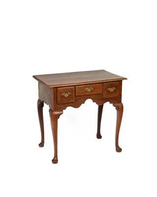 Lot 734 - A George III elm lowboy